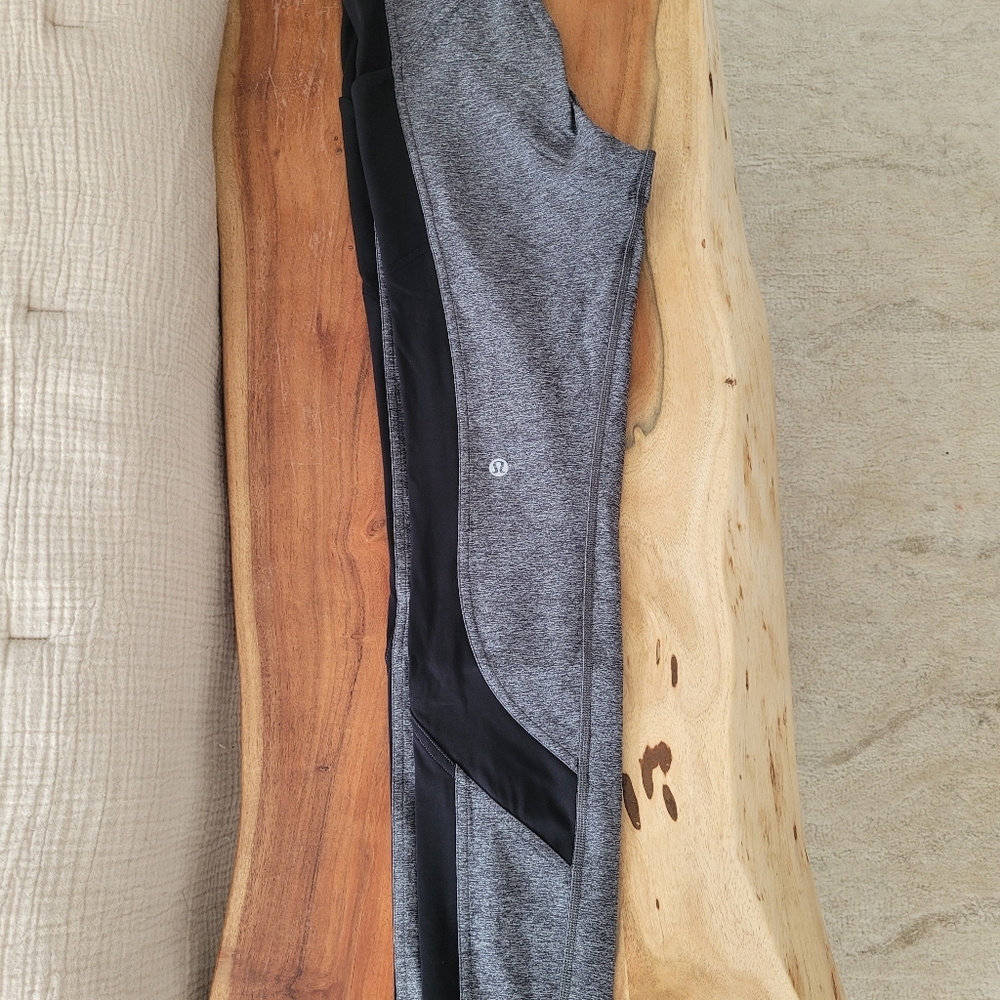 Lululemon size 4 grey high-waisted leggings with black stripe